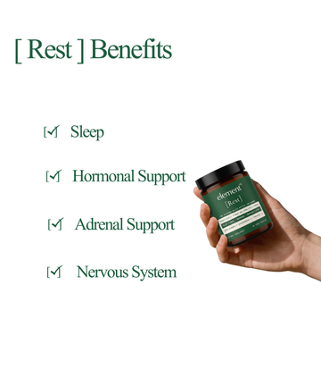 A hand holds a small dark jar labeled 'element [rest]' against a light cream background with green text listing benefits: sleep, hormonal support, adrenal support, and nervous system.